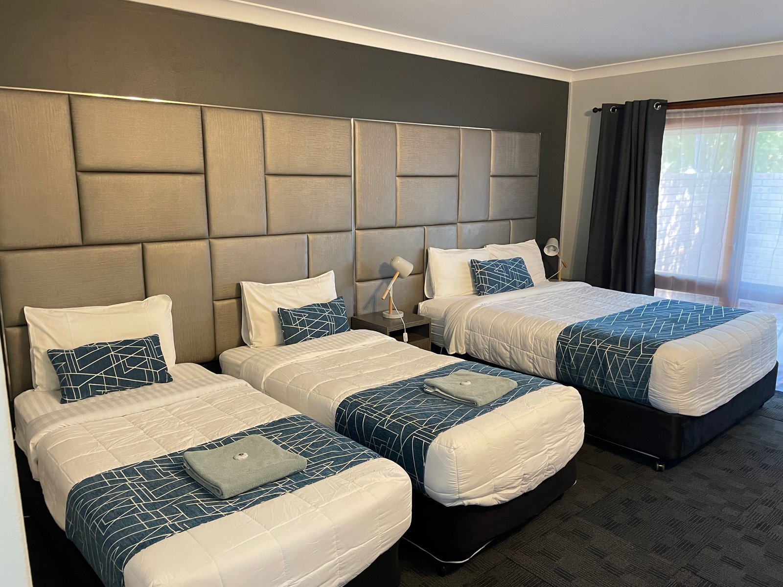 Family Room with Backyard View at Parkway Motel